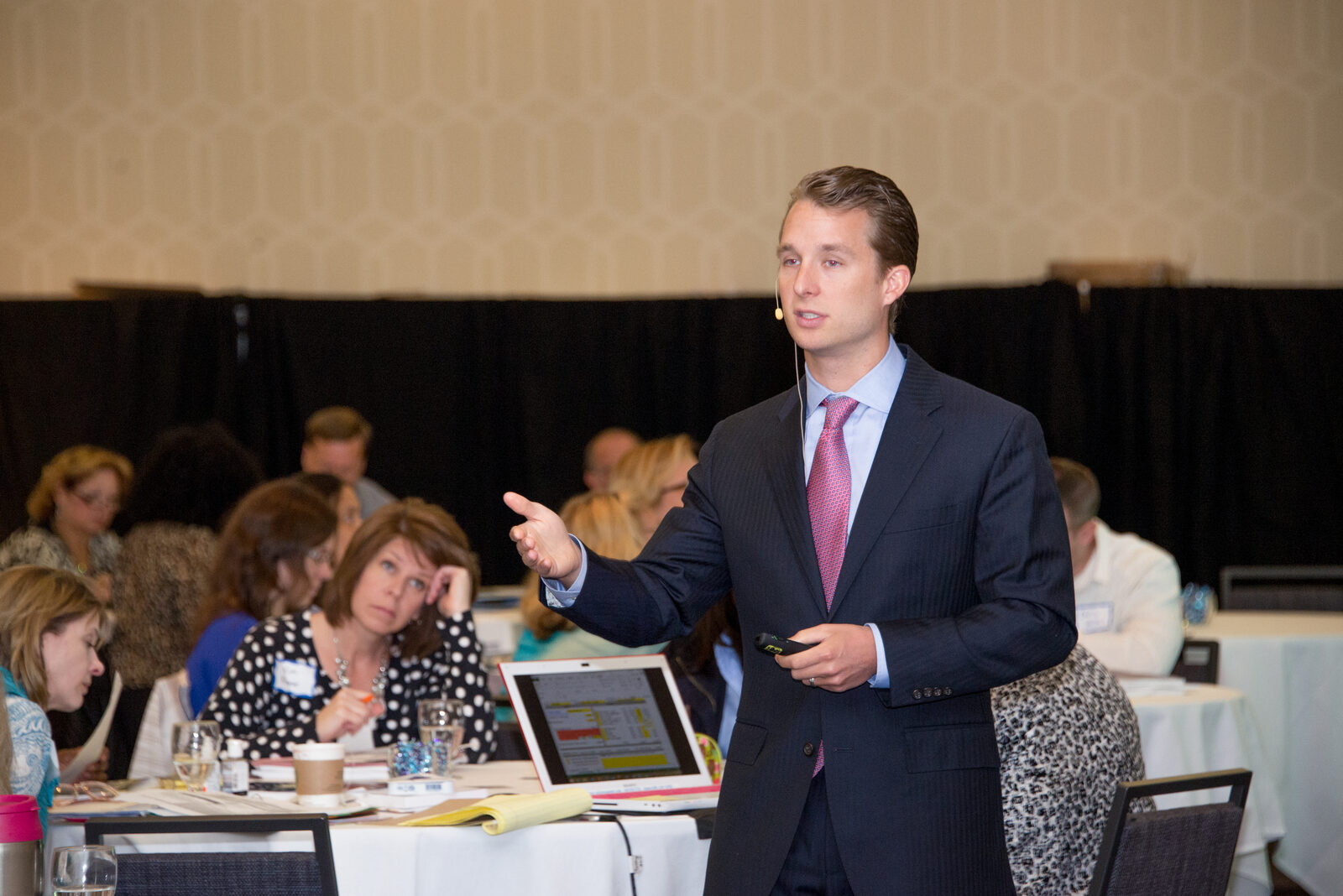 Dr. Aaron Dahlgren presenting to a room of educators